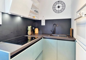 Spend a carefree vacation in this modern furnished vacation home with pool.