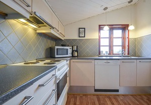 Spend your vacation near Aarhus and at the same time only a short walk from the beach.