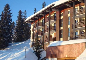 Studio mezzanine 35m², 6 pers, proche pistes et commerces, balcon, ascenseur, casier à skis - FR-1-275-143
