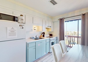 Studio on the lagoon with balcony, pool, & tennis - walk to dining & beach
