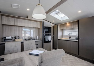 Stunning 13ft-wide holiday home with one double with en-suite shower and one twin.
