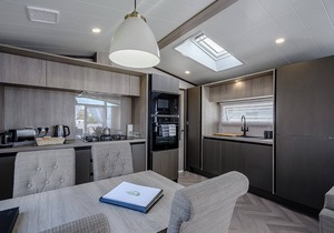 Stunning 13ft-wide holiday home with one double with en-suite shower and one twin.