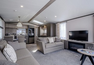 Stunning 13ft-wide holiday home with one double with en-suite shower and one twin.