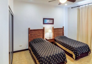 Stunning beachfront condo with WiFi, shared pool, & sweeping ocean views