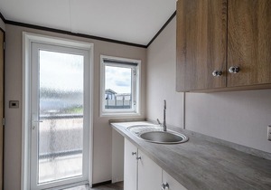 Stunning Lodge with one double with ensuite shower and one twin.