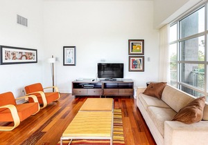 Stylish coastal condo w/ shared pool, floor-to-ceiling windows & free WiFi