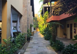 Suite 2-104 em Flat frente ao mar