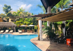 Suite 2-104 em Flat frente ao mar