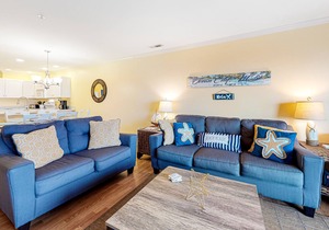 Sunny condo w/balcony, water views, shared outdoor pool + kiddie pool