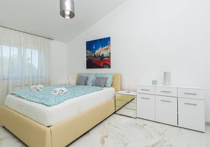 These two spacious apartments are modern and comfortably furnished.
