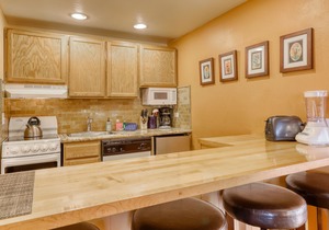 Third-floor condo with loft, hot tub, heated outdoor pool, WiFi, & fireplace