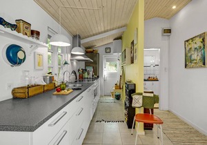 This cozy vacation home welcomes you near the beach in Bjerge Nordstrand.