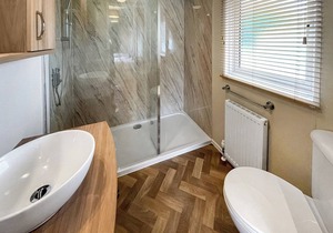 This exclusive holiday home boasts a stylish and contemporary design.