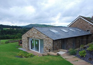 This beautifully appointed apartment is set within a converted farmhouse.