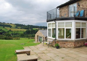This beautifully appointed apartment is set within a converted farmhouse.