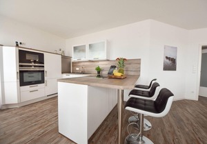 This newly built house is located in the small fishing village of Kamminke, in only