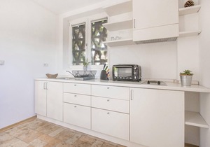 This vacation apartment in Capriva del Friuli (province of Gorizia) was obtained from an old stable