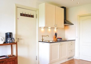 This vacation apartment is located in a farmhouse on the second floor.