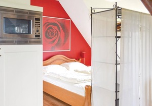 This vacation apartment is located in a farmhouse on the second floor.