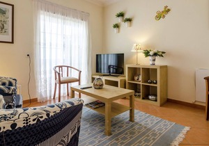 This warm and comfortable apartment is located just outside the city of Lagos.