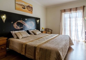 This warm and comfortable apartment is located just outside the city of Lagos.