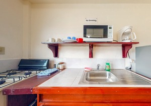 Three vibrant studios w/full kitchens, adult bikes, free WiFi & partial AC