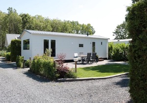 Tidy chalet with a microwave, near the Wadden Sea