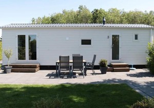 Tidy chalet with a microwave, near the Wadden Sea