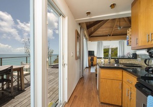 Touch of Class 1BR, A Beachfront Home on the Warm Calm Caribbean