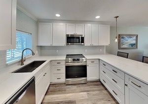 Tradewinds 101 | Beachfront Condo with Patio, Pool View and Beach Access