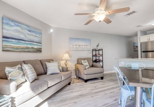 Trendy condo with full kitchen, shared pool, and easy beach access