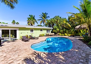 Tropical-themed getaway w/ heated private pool - walk to free trolley, shopping