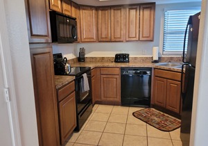 Tucson flair in this 2nd floor-serene patio -close to main pool- exercise rm