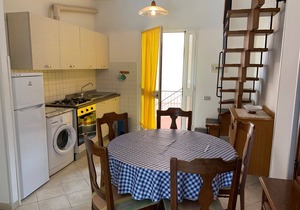 Two bedroom apartment with verandah, 100m from the beach. Free WiFi.