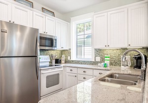 Two Golf Carts Included ~ Private Porch ~ Family Friendly ~ Spacious Kitchen