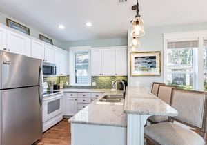 Two Golf Carts Included ~ Private Porch ~ Family Friendly ~ Spacious Kitchen
