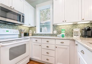Two Golf Carts Included ~ Private Porch ~ Family Friendly ~ Spacious Kitchen