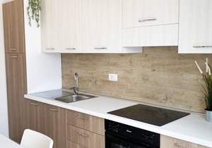 Two-story three-room apartment within walking distance of the sea, in a serviced area, with two balconies