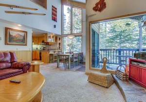 Two-level, forest-view condo with deck - steps from the Village & Ski Back Trail