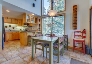 Two-level, forest-view condo with deck - steps from the Village & Ski Back Trail