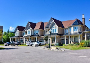 Two-story condo with patio, fireplace, grill, & heated pool - dog-friendly
