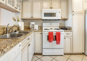 Two story villa with views of Cap’n Sam’s Creek and community pool access