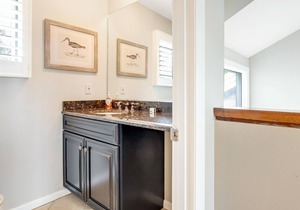 Two story villa with views of Cap’n Sam’s Creek and community pool access