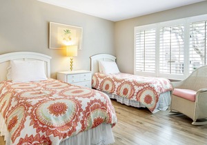 Two story villa with views of Cap’n Sam’s Creek and community pool access