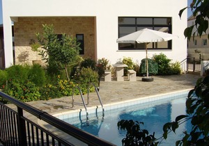 Two very large, bright apartment with private garden, pool and grill
