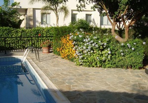 Two very large, bright apartment with private garden, pool and grill