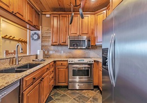 Updated Condominium with Fireplace, Wine Fridge and Granite Countertops
