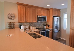 Updated Oceanfront condo with covered deck, indoor and outdoor pools.