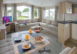 Very comfortable, modern and contemporary caravan with one double and two twin.