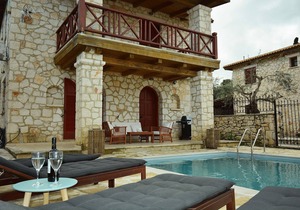 Villa Nephele of Jootiq Villas. Combine traditional stone built concept with supreme comfort!